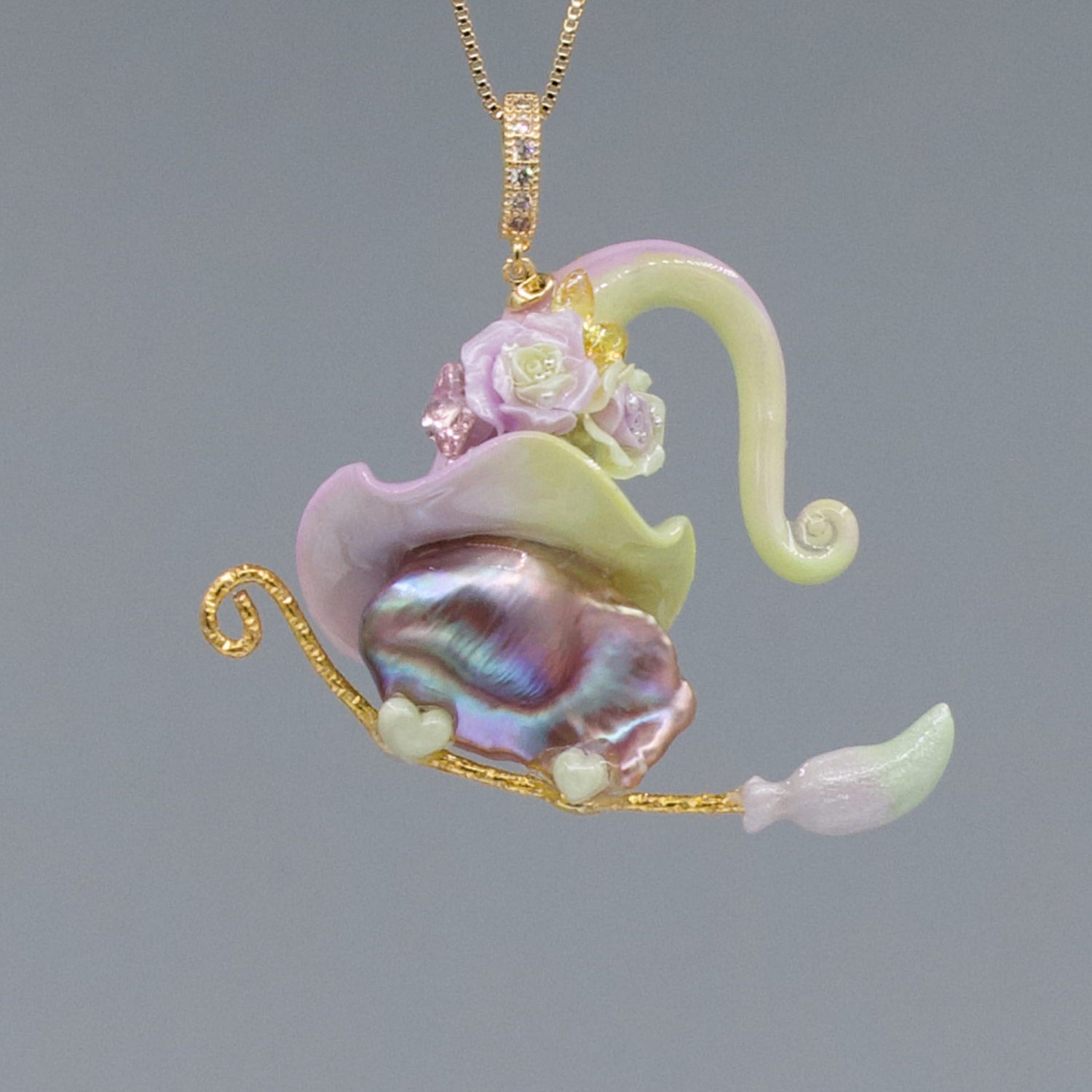 Pearlolo hat collection featuring one-of-a-kind natural pearls topped with hand-sculpted resin designs.