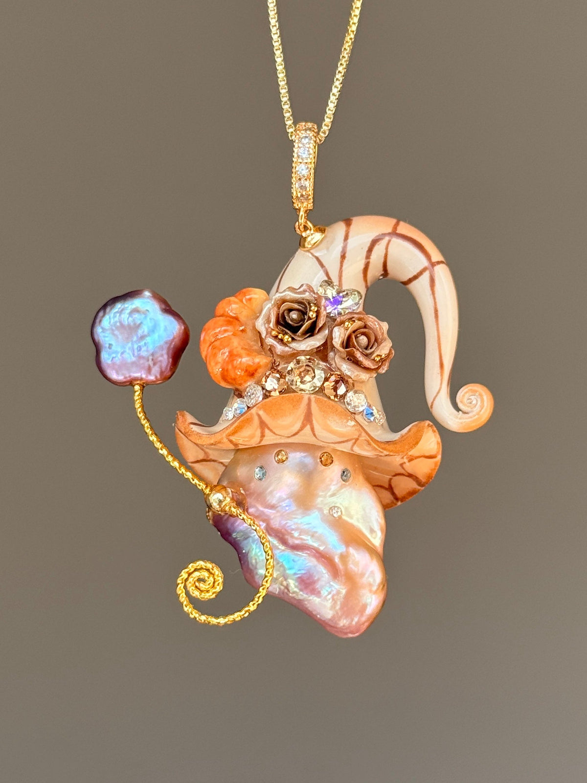 [PIECE01] Bakery Sprite baroque pearl necklace with peach croissant-inspired hat, sculpted croissant detail, brown floral accents, gold wand, and natural baroque pearl
