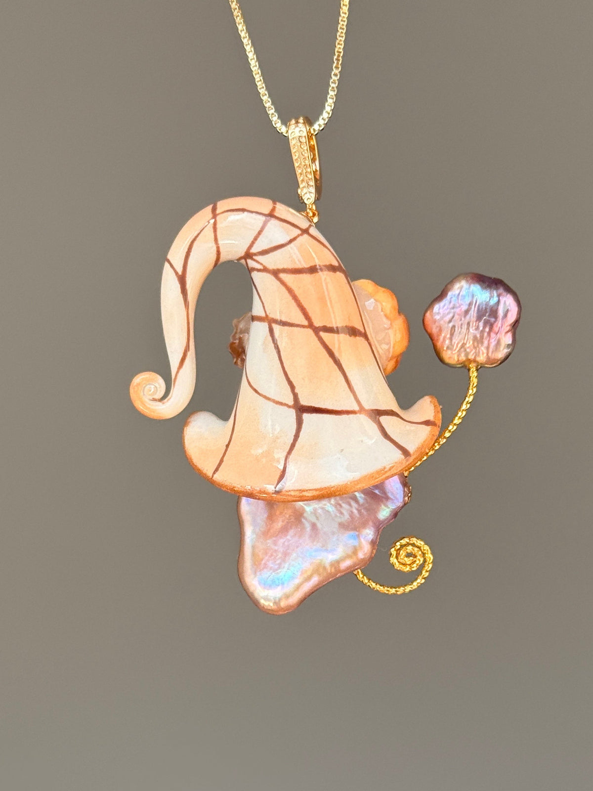 [PIECE01] Bakery Sprite baroque pearl necklace with peach croissant-inspired hat, sculpted croissant detail, brown floral accents, gold wand, and natural baroque pearl