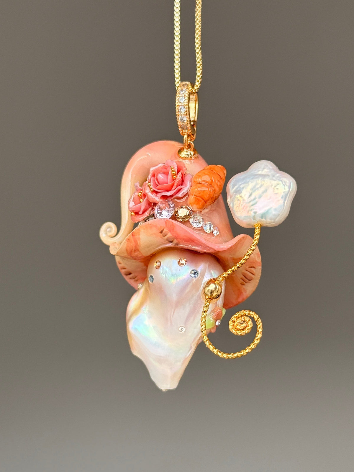 [PIECE02] Bakery Sprite baroque pearl necklace with peach croissant-inspired hat, sculpted croissant detail, pink floral accents, gold wand, and natural baroque pearl
