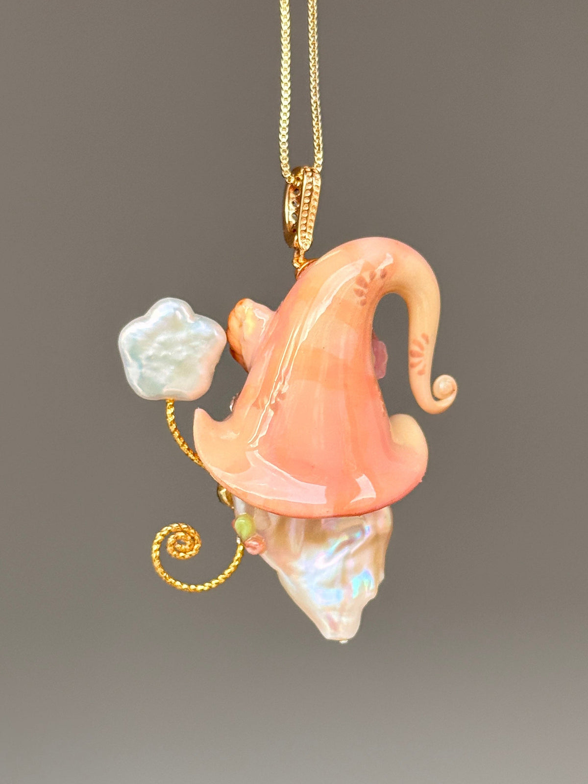[PIECE02] Bakery Sprite baroque pearl necklace with peach croissant-inspired hat, sculpted croissant detail, pink floral accents, gold wand, and natural baroque pearl