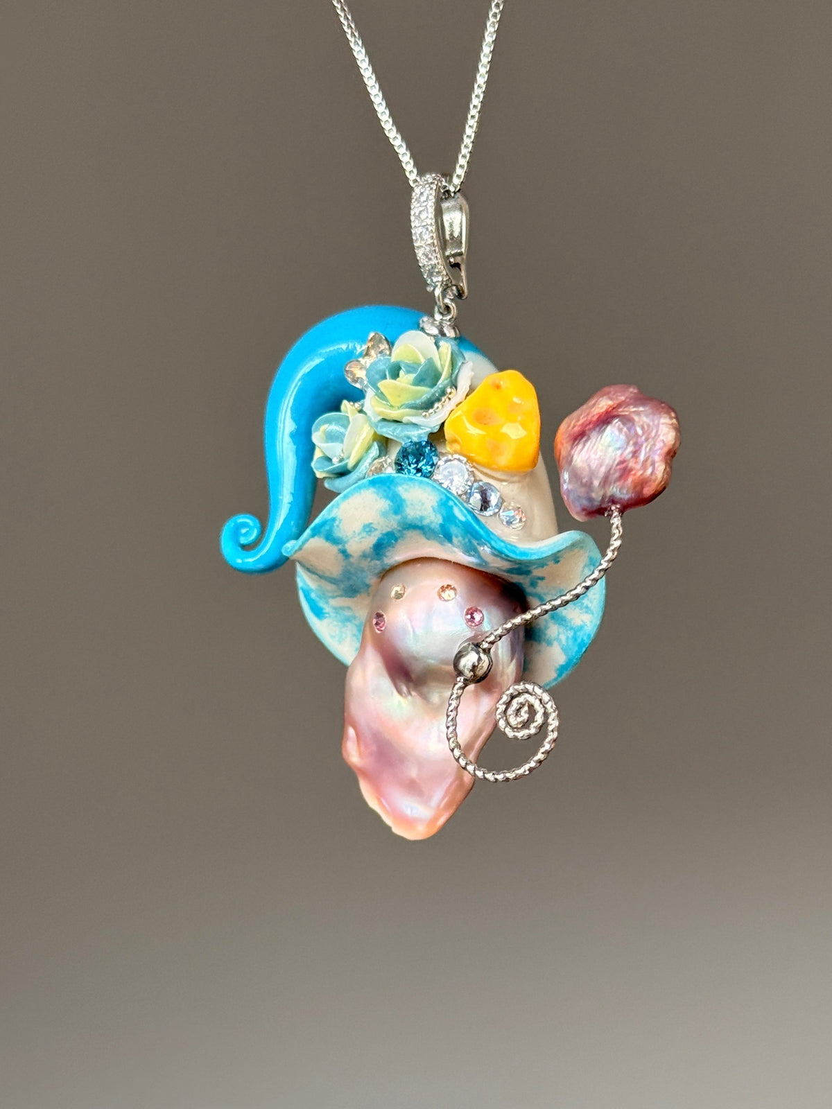 [PIECE02] Cheese Sprite baroque pearl necklace with bright blue curled hat, mint sculpted roses, yellow cheese wedge detail, silver wand, pink pearl accent, and natural baroque pearl