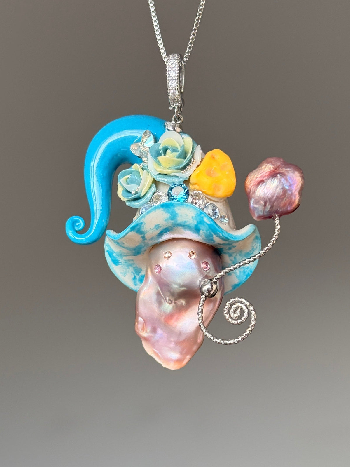 [PIECE02] Cheese Sprite baroque pearl necklace with bright blue curled hat, mint sculpted roses, yellow cheese wedge detail, silver wand, pink pearl accent, and natural baroque pearl