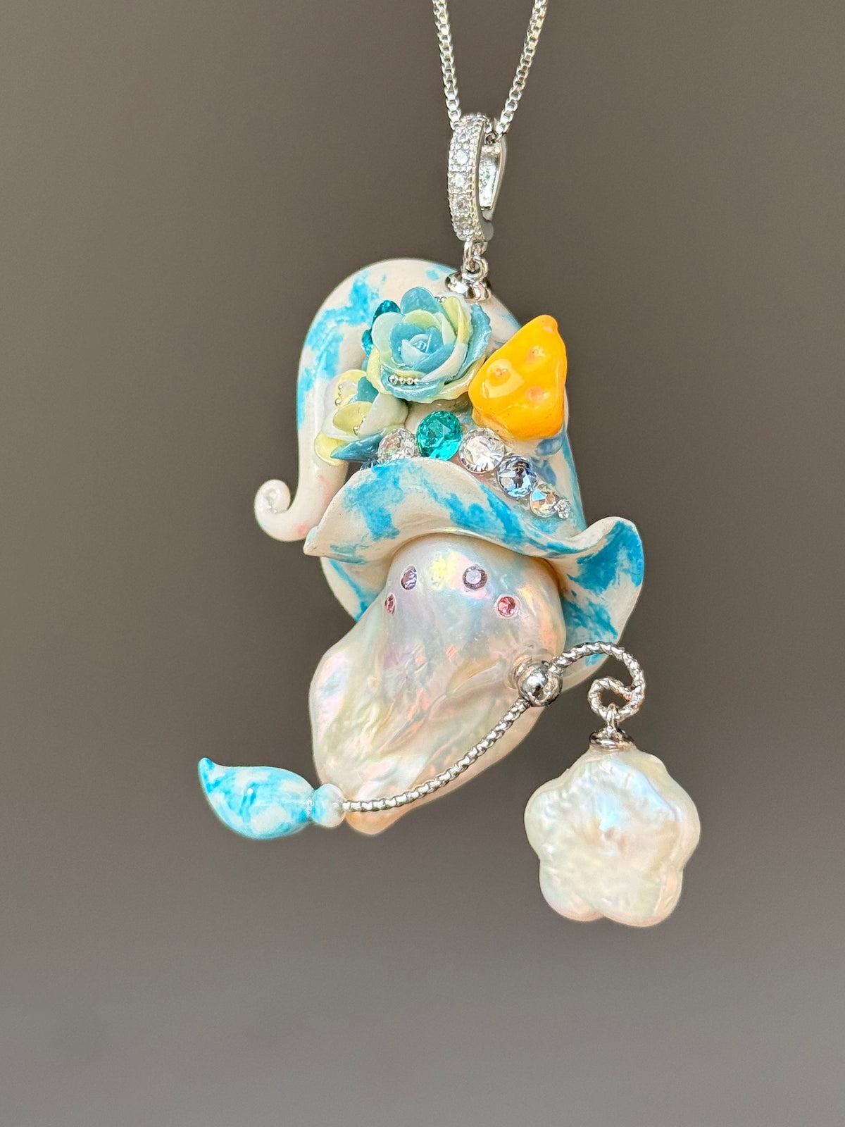 [PIECE04] Cheese Sprite baroque pearl necklace with white and aqua curled hat, pale blue sculpted roses, yellow cheese wedge detail, silver wand, pearl-tipped charm, and natural baroque pearl