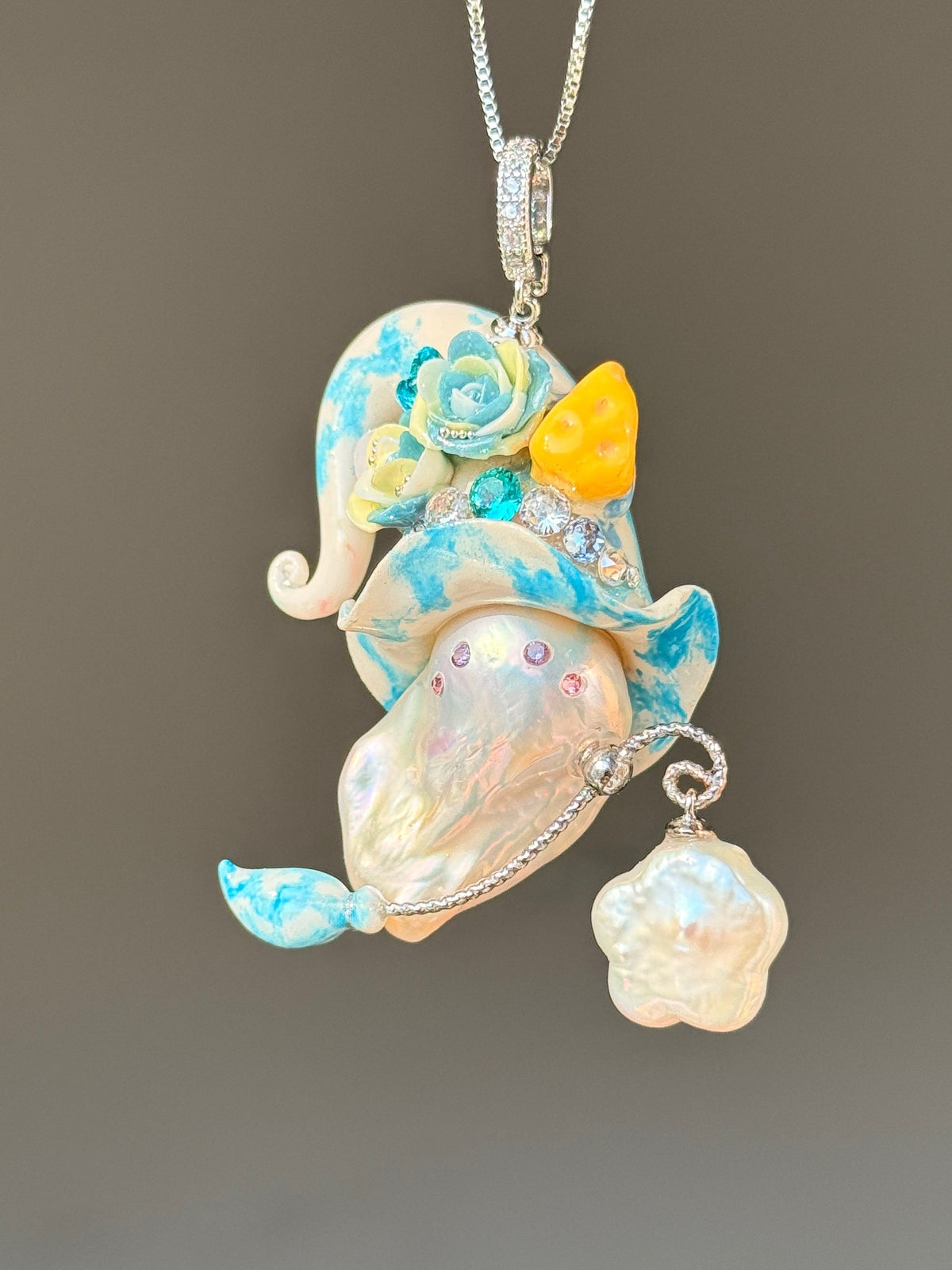 [PIECE04] Cheese Sprite baroque pearl necklace with white and aqua curled hat, pale blue sculpted roses, yellow cheese wedge detail, silver wand, pearl-tipped charm, and natural baroque pearl