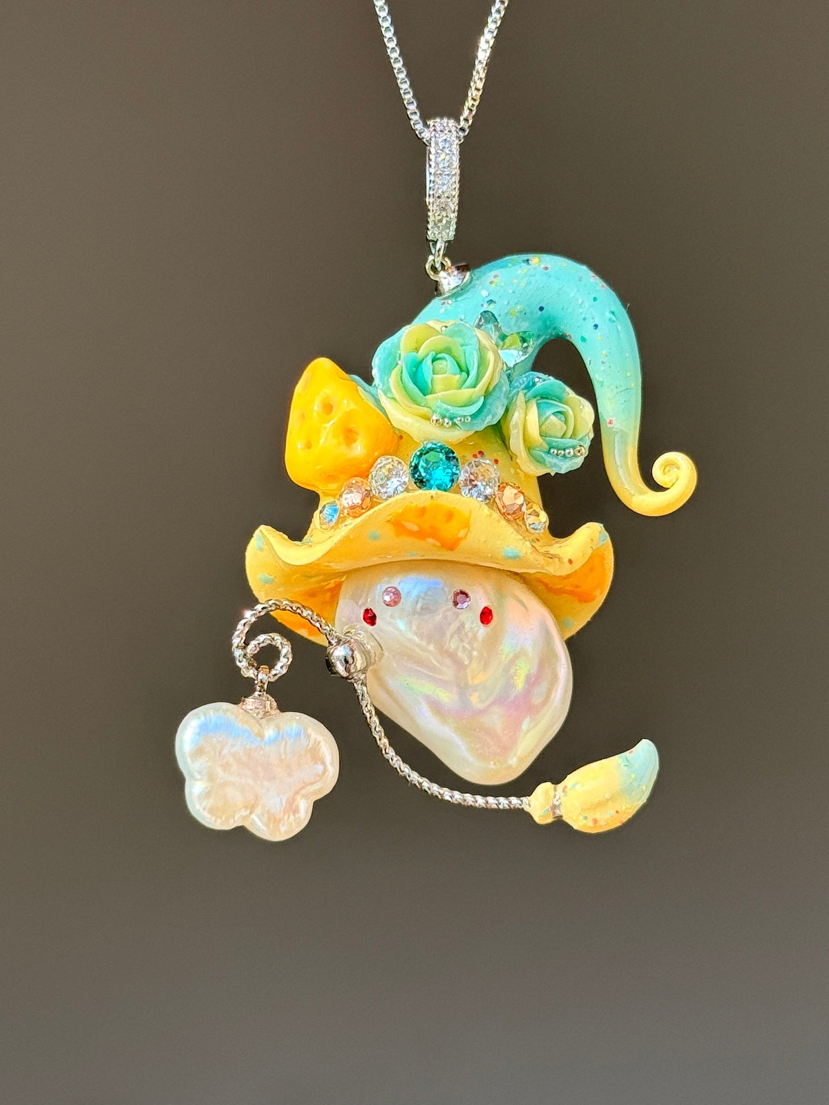 [PIECE05] Cheese Sprite baroque pearl necklace with turquoise and yellow curled hat, aqua sculpted roses, sculpted cheese details, silver wand, pearl charm, and natural baroque pearl