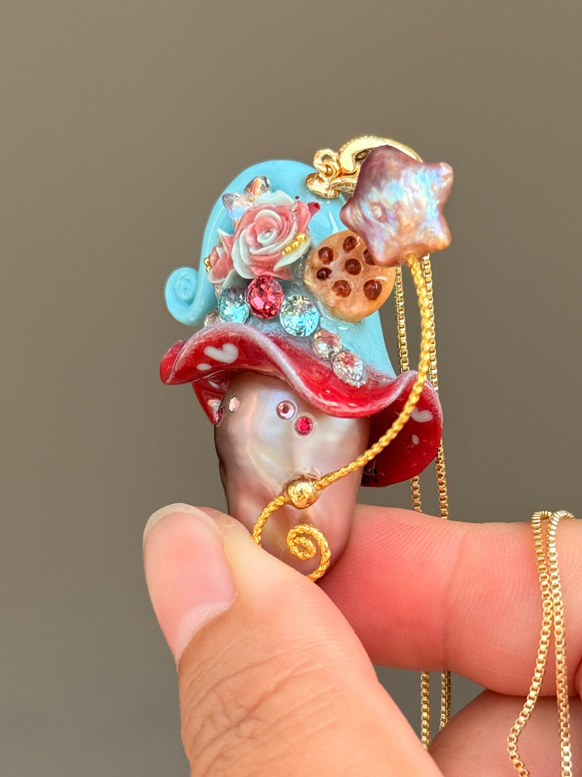 [PIECE04] Cookie Sprite baroque pearl necklace with cookie-inspired hat, sculpted cookie detail, pastel floral accents, sparkling stones, silver wand, and natural baroque pearl