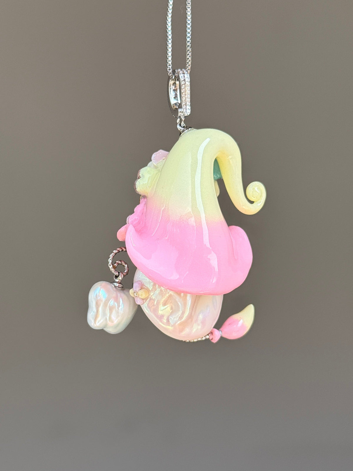 [PIECE02] Lollipop Sprite baroque pearl necklace with a curled mini hat, sculpted candy details, floral accents, sparkling crystals, a dangling charm, and natural baroque pearl