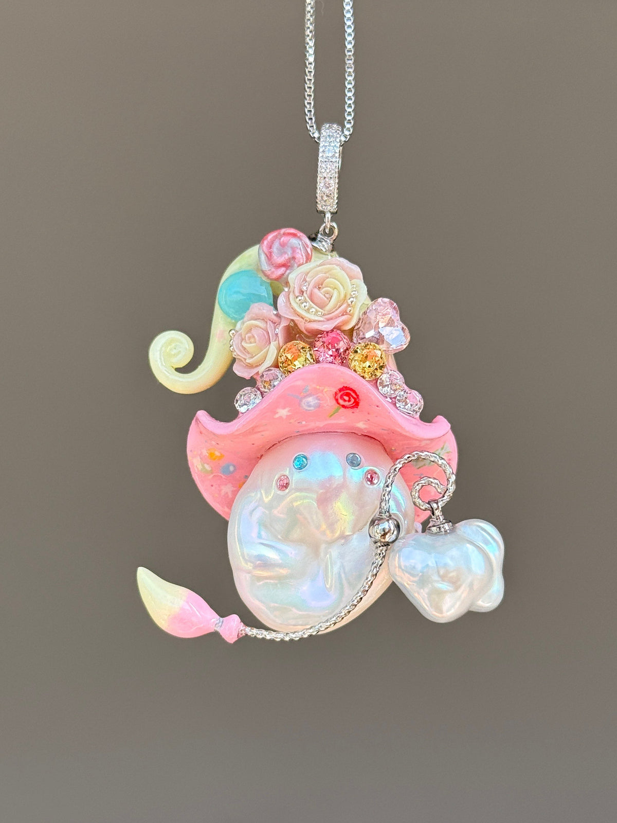 [PIECE02] Lollipop Sprite baroque pearl necklace with a curled mini hat, sculpted candy details, floral accents, sparkling crystals, a dangling charm, and natural baroque pearl