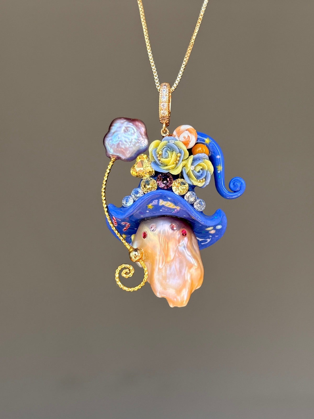 [PIECE05] Lollipop Sprite baroque pearl necklace with a curled mini hat, sculpted candy details, floral accents, sparkling crystals, a dangling charm, and natural baroque pearl