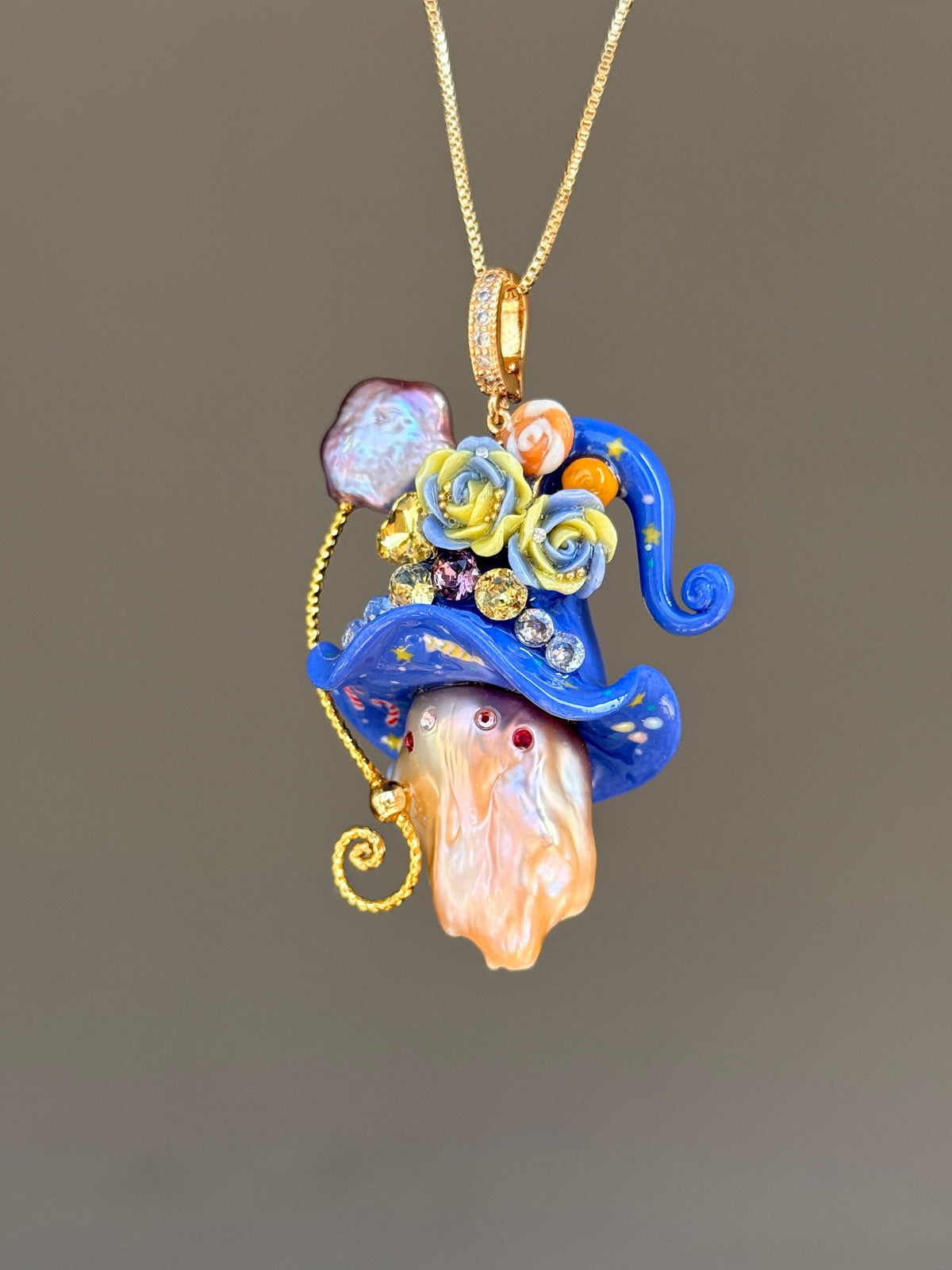 [PIECE05] Lollipop Sprite baroque pearl necklace with a curled mini hat, sculpted candy details, floral accents, sparkling crystals, a dangling charm, and natural baroque pearl