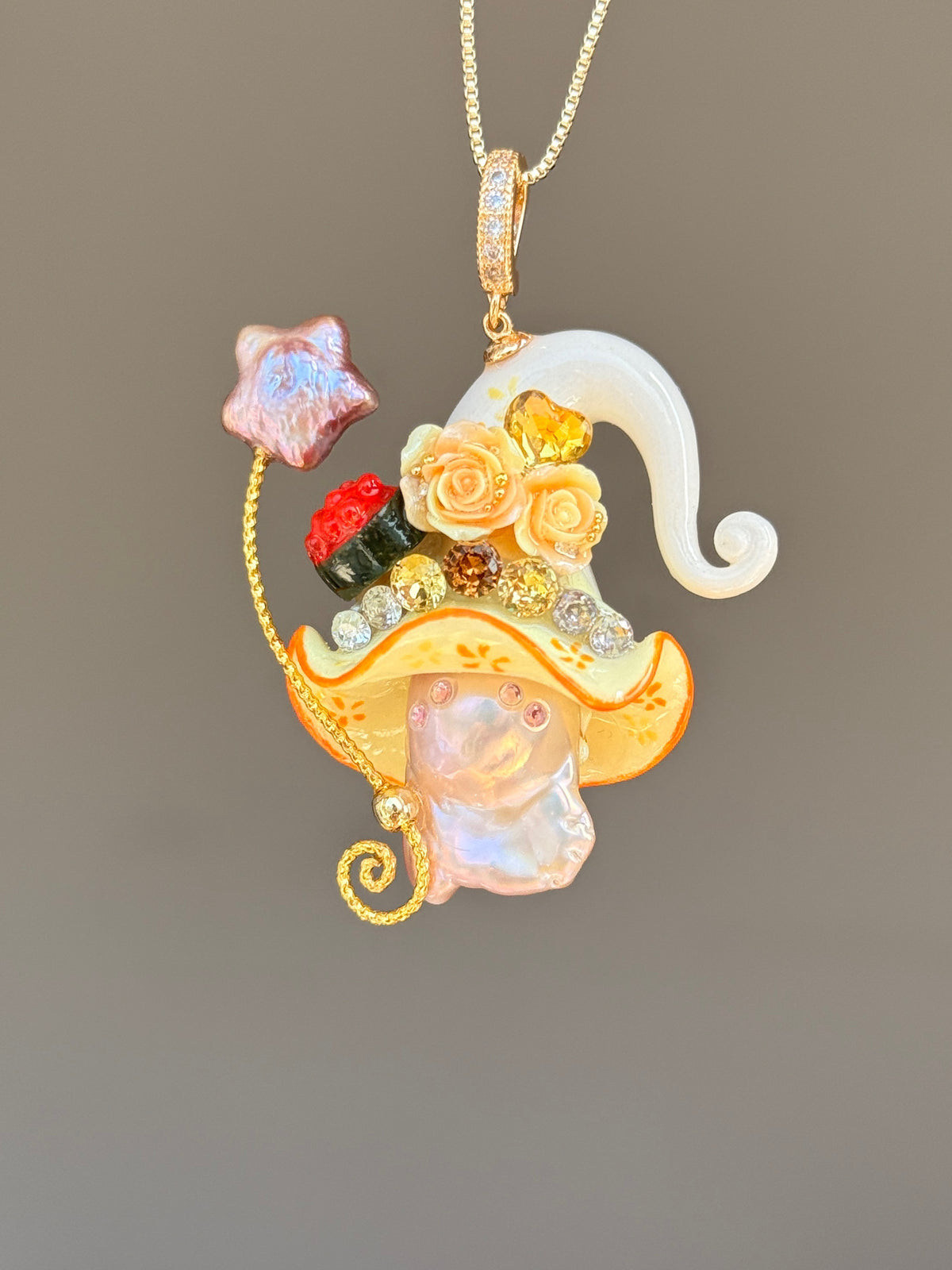 [PIECE03] Sushi Sprite baroque pearl necklace with sushi-inspired hat, sculpted sushi detail, blue floral accents, sparkling stones, dangling charm, and natural baroque pearl