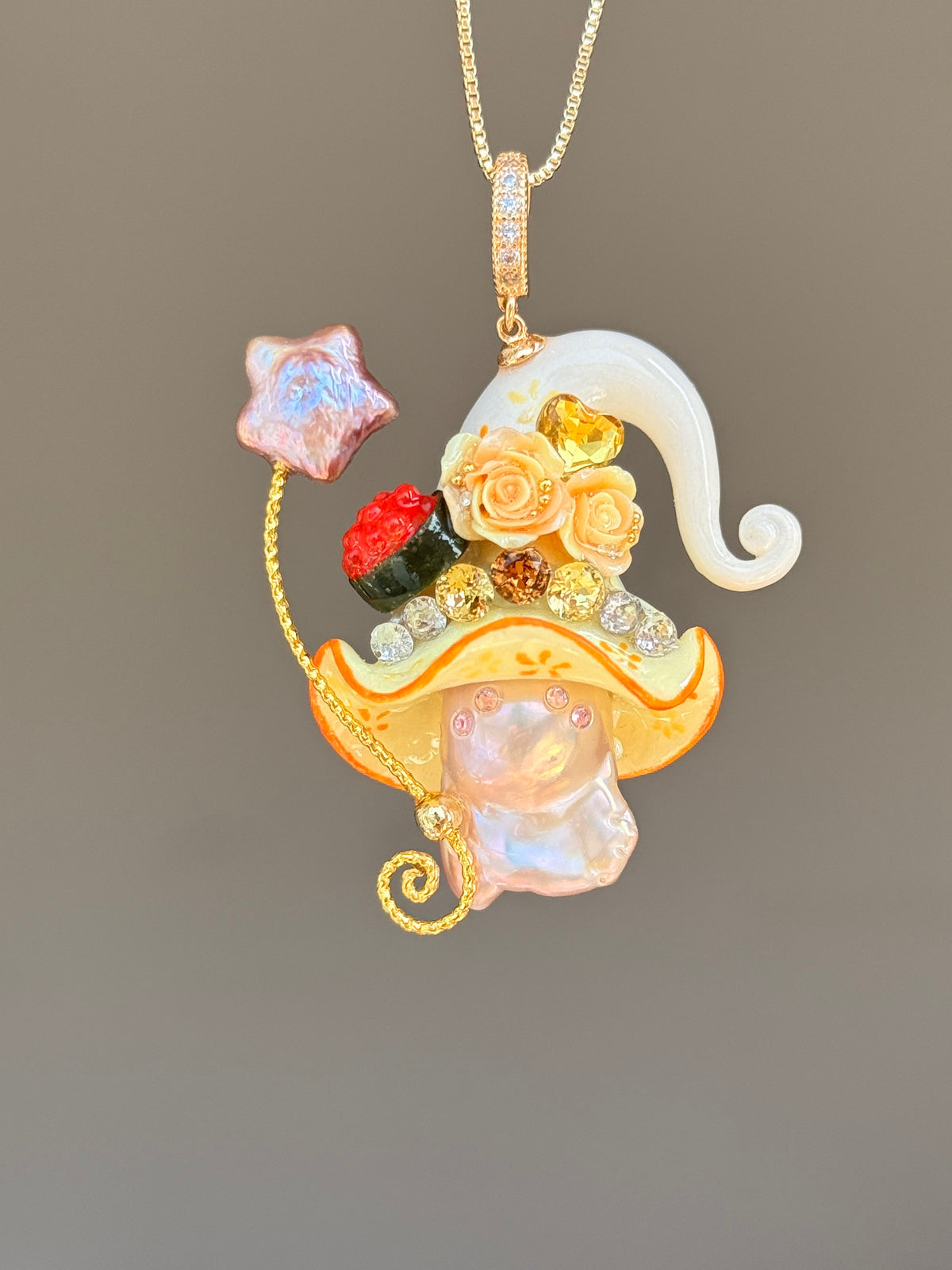 [PIECE03] Sushi Sprite baroque pearl necklace with sushi-inspired hat, sculpted sushi detail, blue floral accents, sparkling stones, dangling charm, and natural baroque pearl