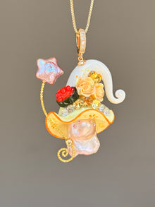 [PIECE03] Sushi Sprite baroque pearl necklace with sushi-inspired hat, sculpted sushi detail, blue floral accents, sparkling stones, dangling charm, and natural baroque pearl