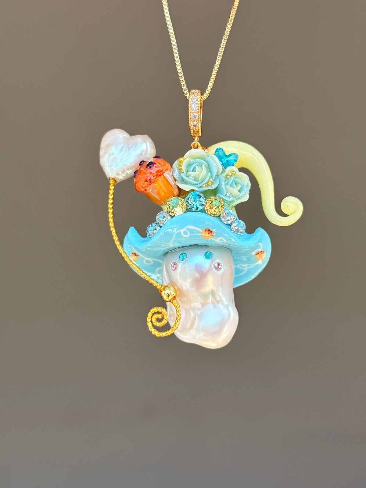 [PIECE04] Muffin Sprite baroque pearl necklace with muffin-inspired hat, pastel floral details, sparkling accents, gold wand, and natural baroque pearl