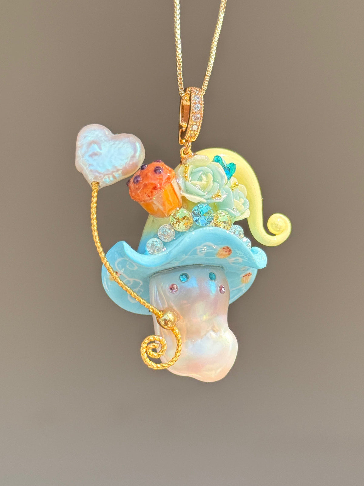 [PIECE04] Muffin Sprite baroque pearl necklace with muffin-inspired hat, pastel floral details, sparkling accents, gold wand, and natural baroque pearl