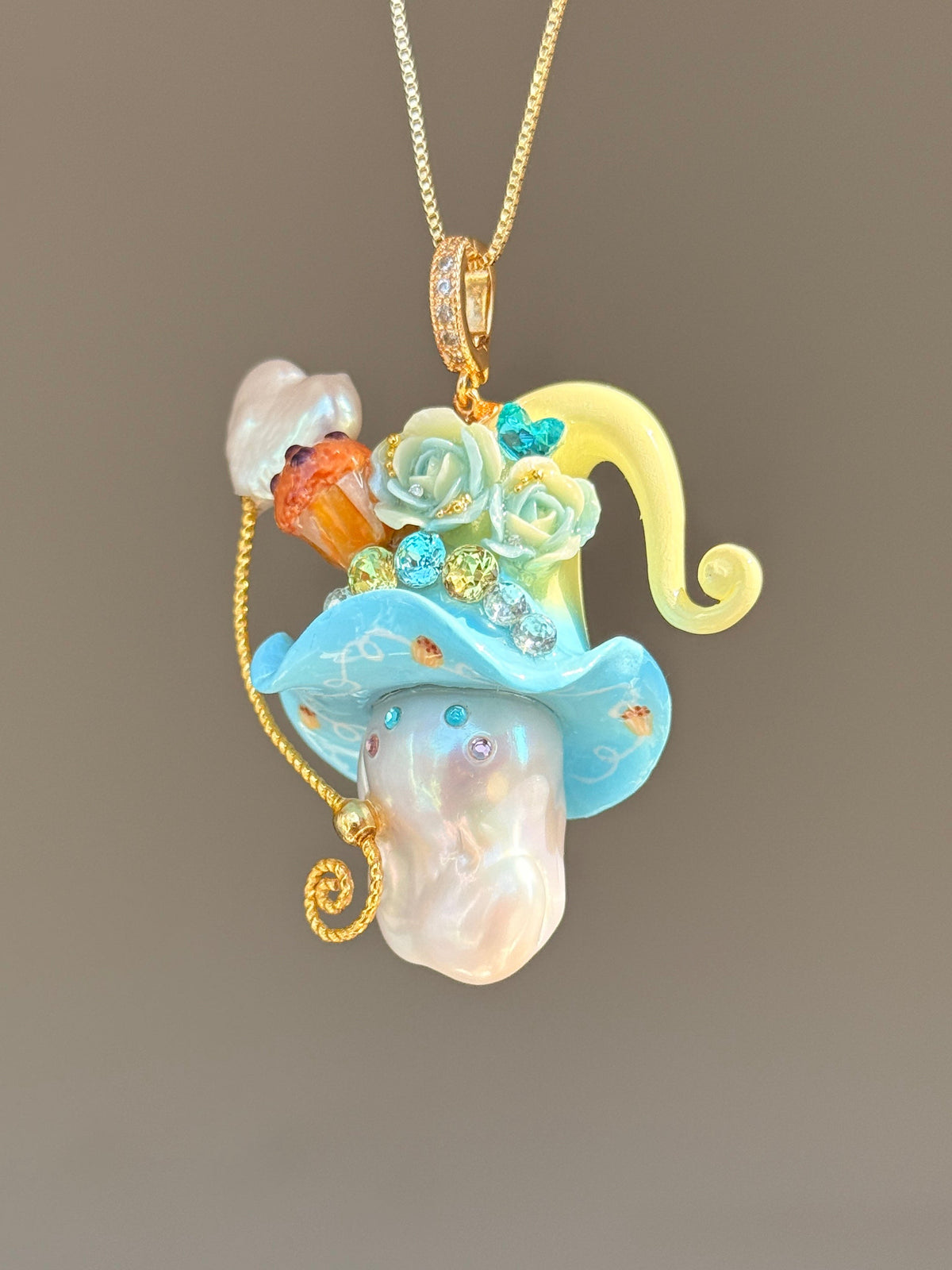 [PIECE04] Muffin Sprite baroque pearl necklace with muffin-inspired hat, pastel floral details, sparkling accents, gold wand, and natural baroque pearl