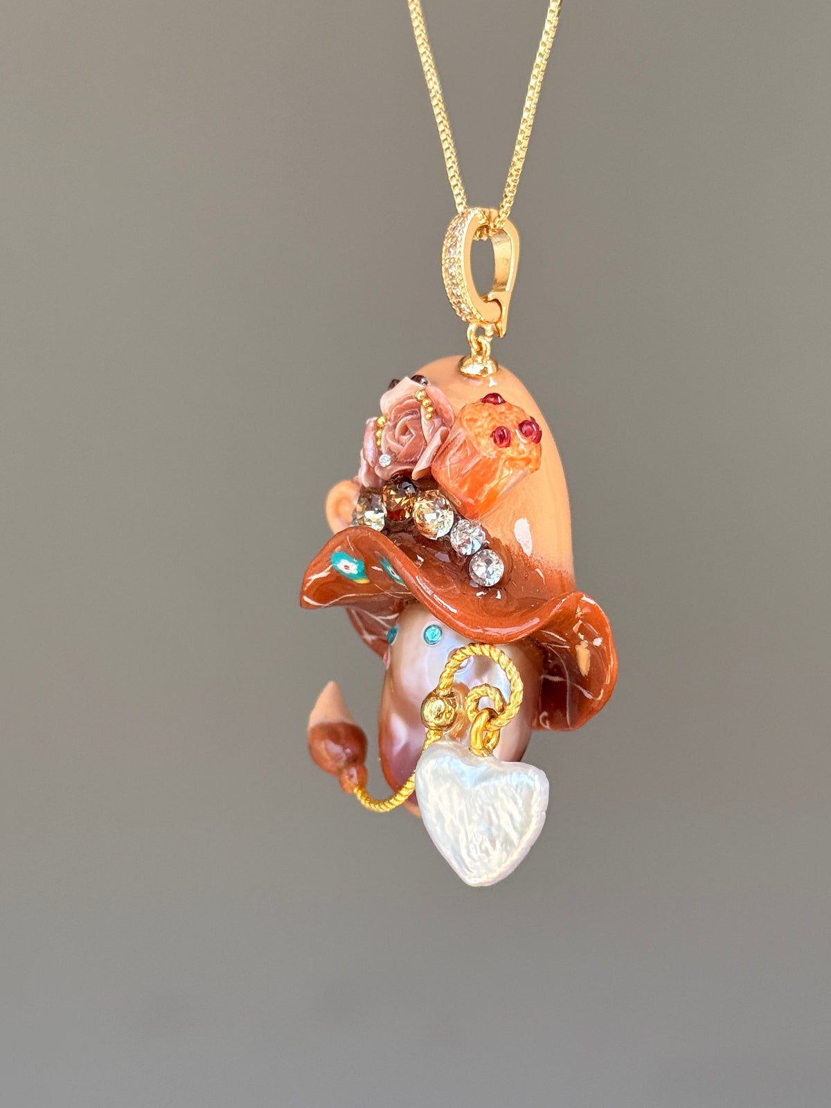 [PIECE02] Muffin Sprite baroque pearl necklace with muffin-inspired hat, pastel floral details, sparkling accents, gold wand, and natural baroque pearl
