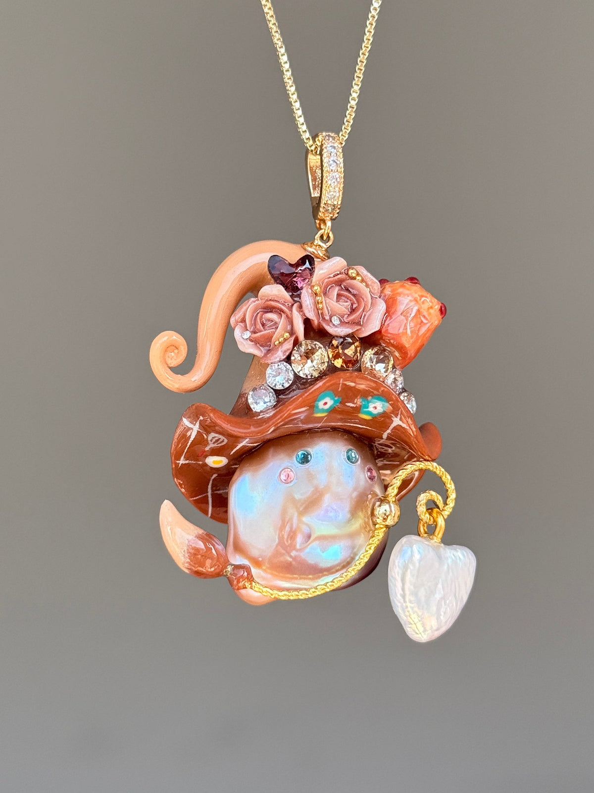 [PIECE02] Muffin Sprite baroque pearl necklace with muffin-inspired hat, pastel floral details, sparkling accents, gold wand, and natural baroque pearl