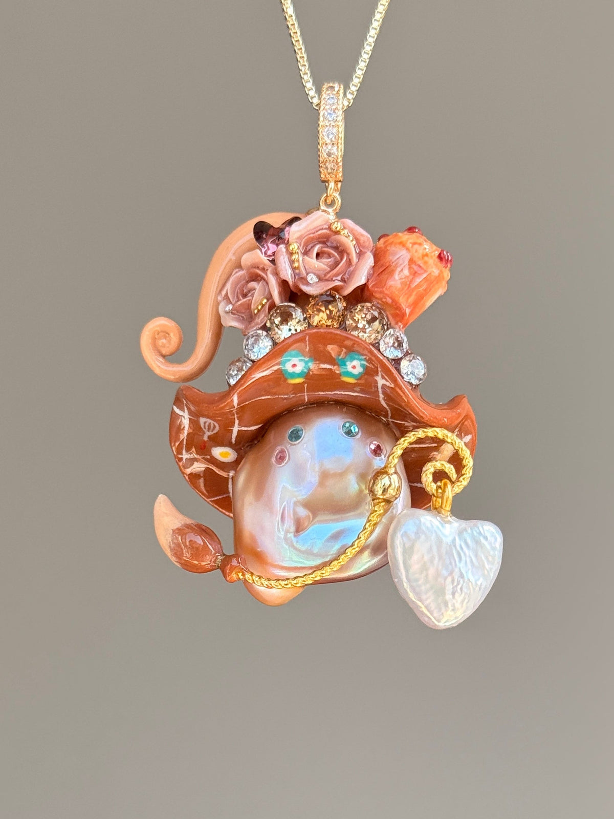 [PIECE02] Muffin Sprite baroque pearl necklace with muffin-inspired hat, pastel floral details, sparkling accents, gold wand, and natural baroque pearl