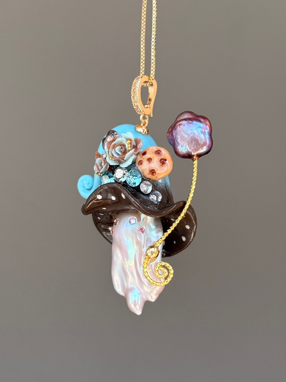 [PIECE03] Cookie Sprite baroque pearl necklace with cookie-inspired hat, sculpted cookie detail, pastel floral accents, sparkling stones, silver wand, and natural baroque pearl