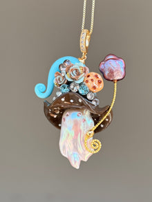 [PIECE03] Cookie Sprite baroque pearl necklace with cookie-inspired hat, sculpted cookie detail, pastel floral accents, sparkling stones, silver wand, and natural baroque pearl