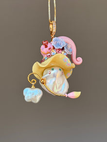 [PIECE03] Donut Dream Sprite baroque pearl necklace with donut-inspired hat, sculpted frosted donut, pastel roses, sparkling stones, playful dessert details, and natural baroque pearl