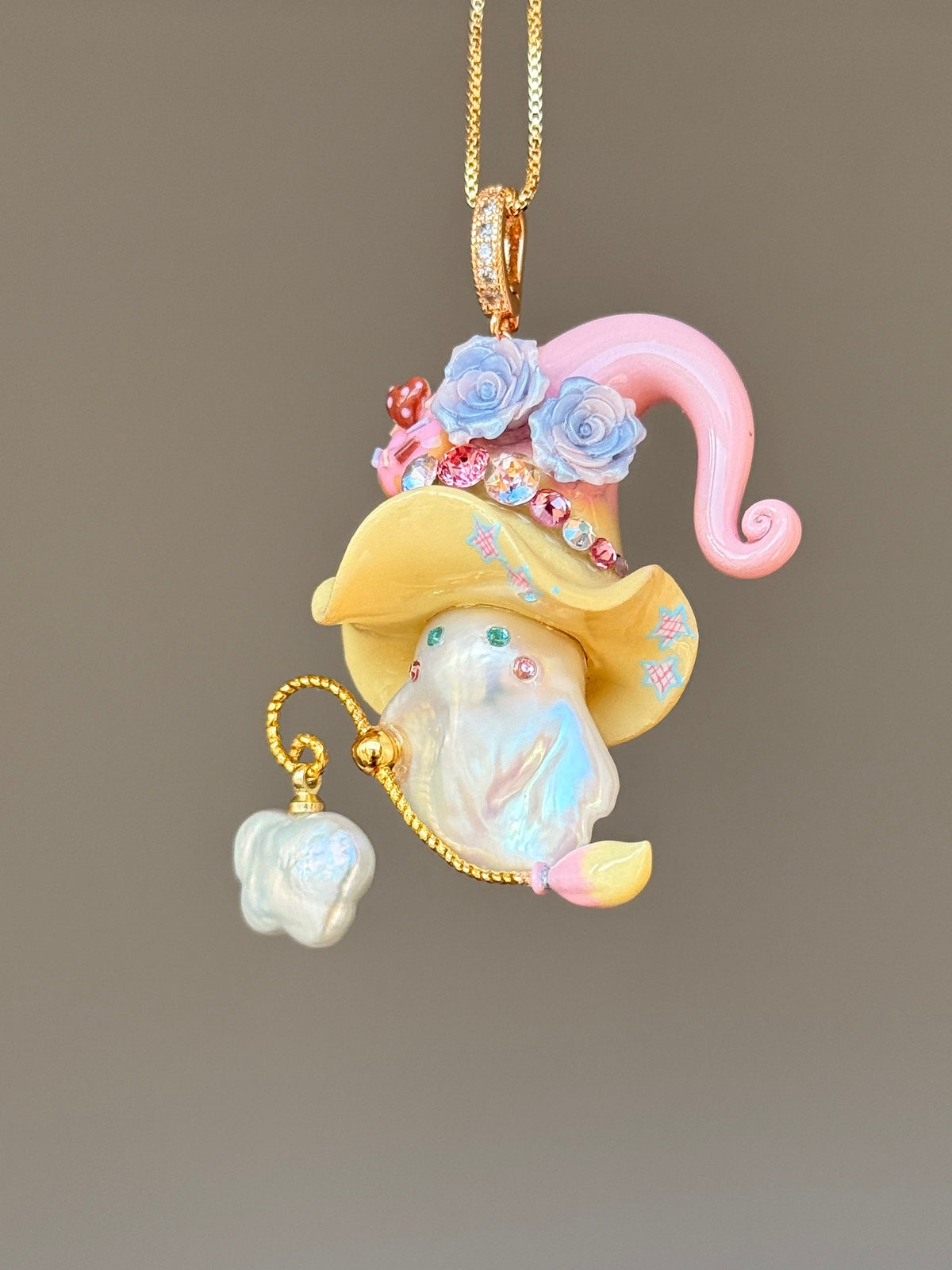 [PIECE03] Donut Dream Sprite baroque pearl necklace with donut-inspired hat, sculpted frosted donut, pastel roses, sparkling stones, playful dessert details, and natural baroque pearl