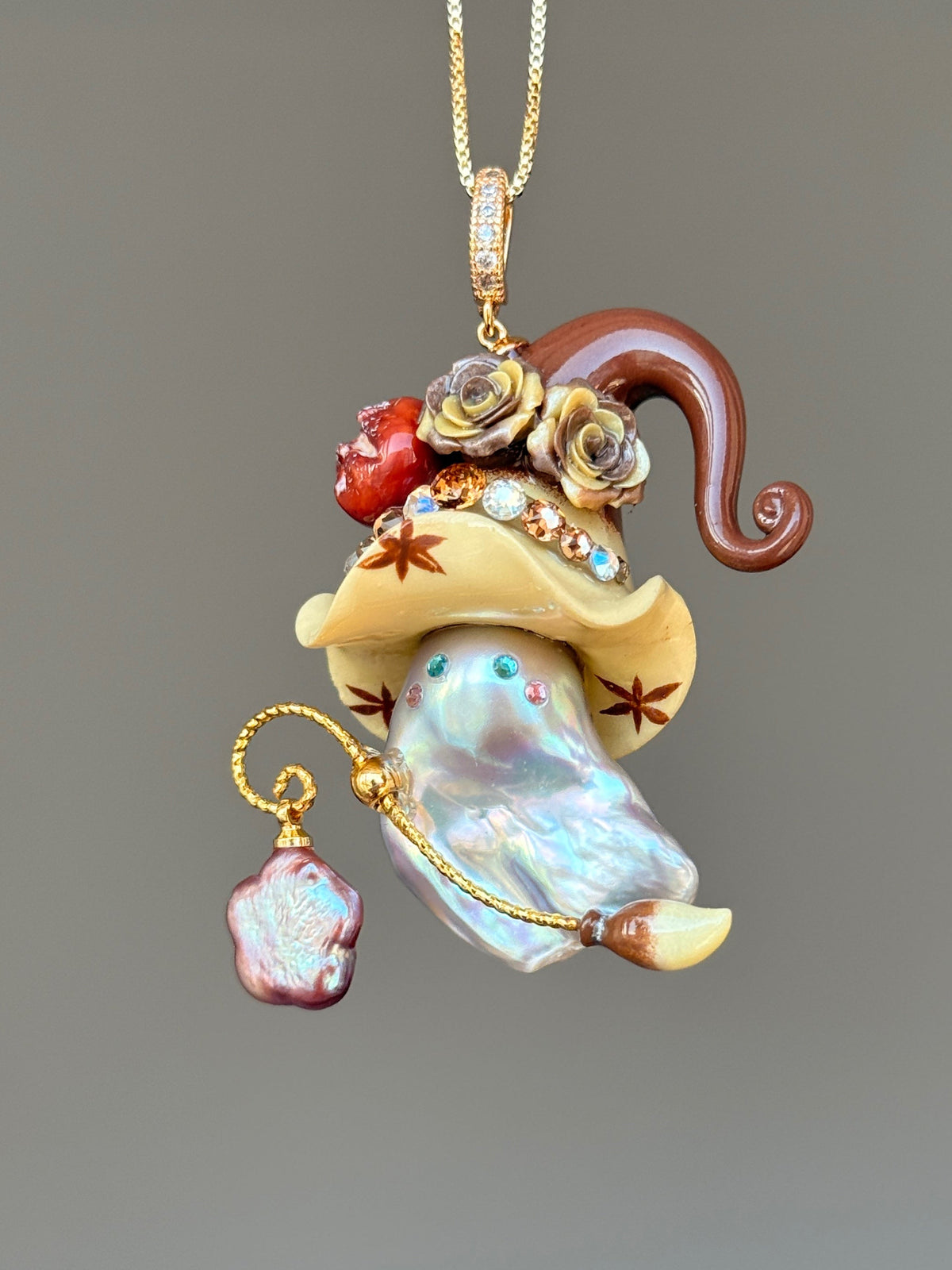 [PIECE06] Bakery Sprite baroque pearl necklace with cream pretzel bread-inspired hat, sculpted lye bread detail, floral accents, gold wand, and natural baroque pearl