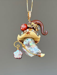 [PIECE06] Bakery Sprite baroque pearl necklace with cream pretzel bread-inspired hat, sculpted lye bread detail, floral accents, gold wand, and natural baroque pearl
