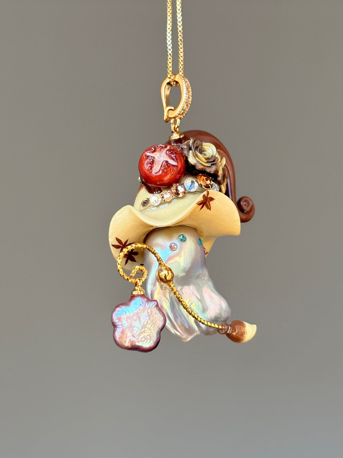 [PIECE06] Bakery Sprite baroque pearl necklace with cream pretzel bread-inspired hat, sculpted lye bread detail, floral accents, gold wand, and natural baroque pearl