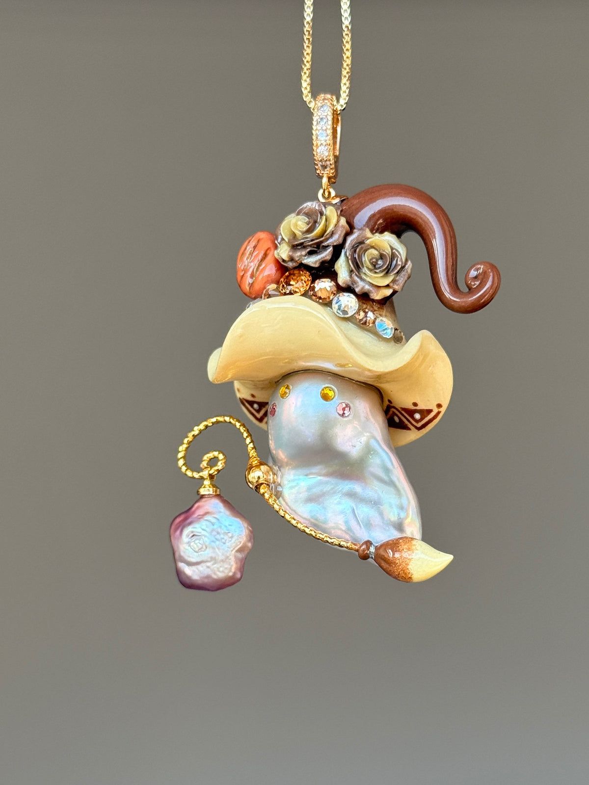 [PIECE08] Bakery Sprite baroque pearl necklace with artisan roll-inspired hat, sculpted bread detail, floral accents, gold wand, and natural baroque pearl