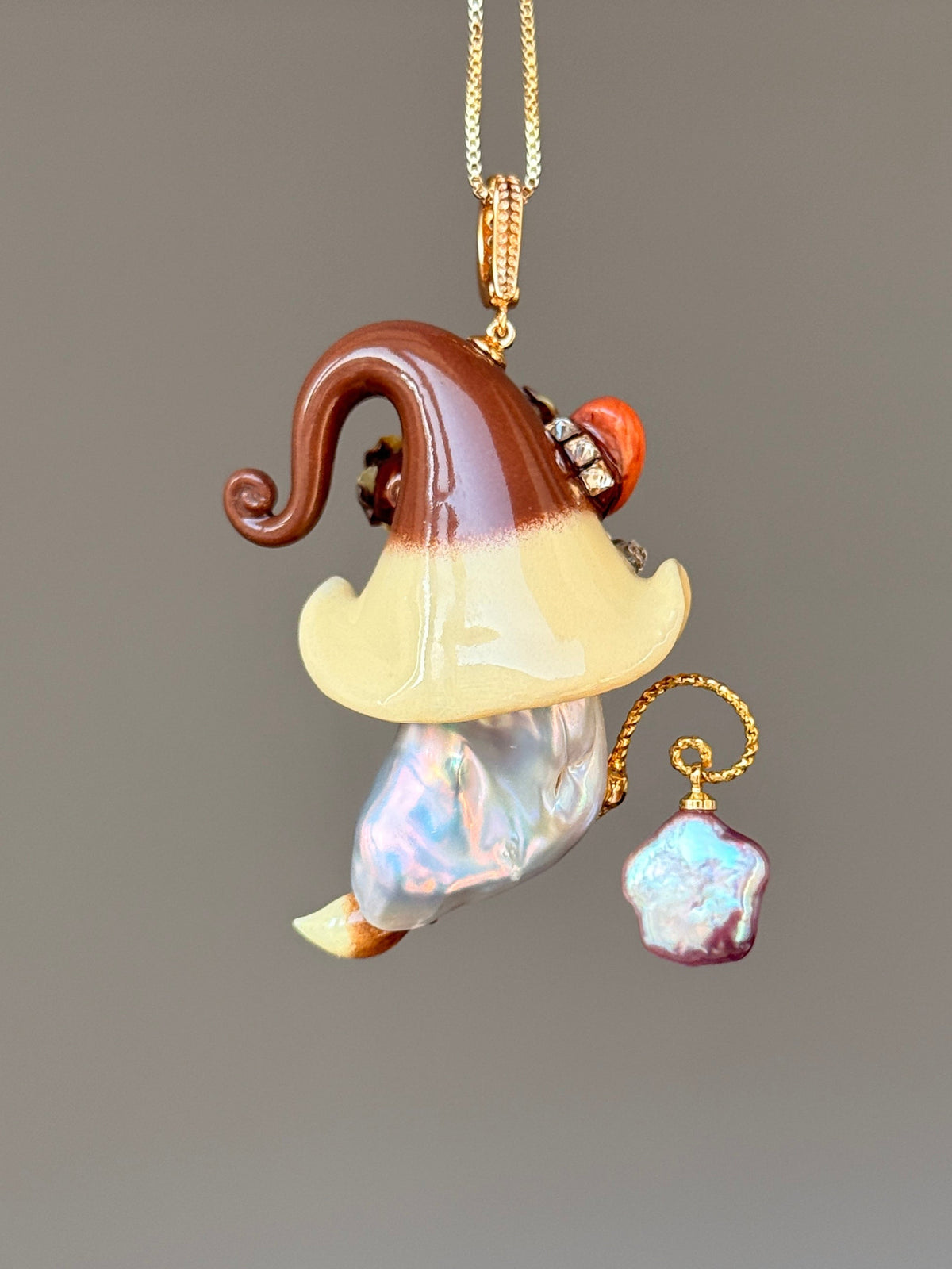 [PIECE08] Bakery Sprite baroque pearl necklace with artisan roll-inspired hat, sculpted bread detail, floral accents, gold wand, and natural baroque pearl