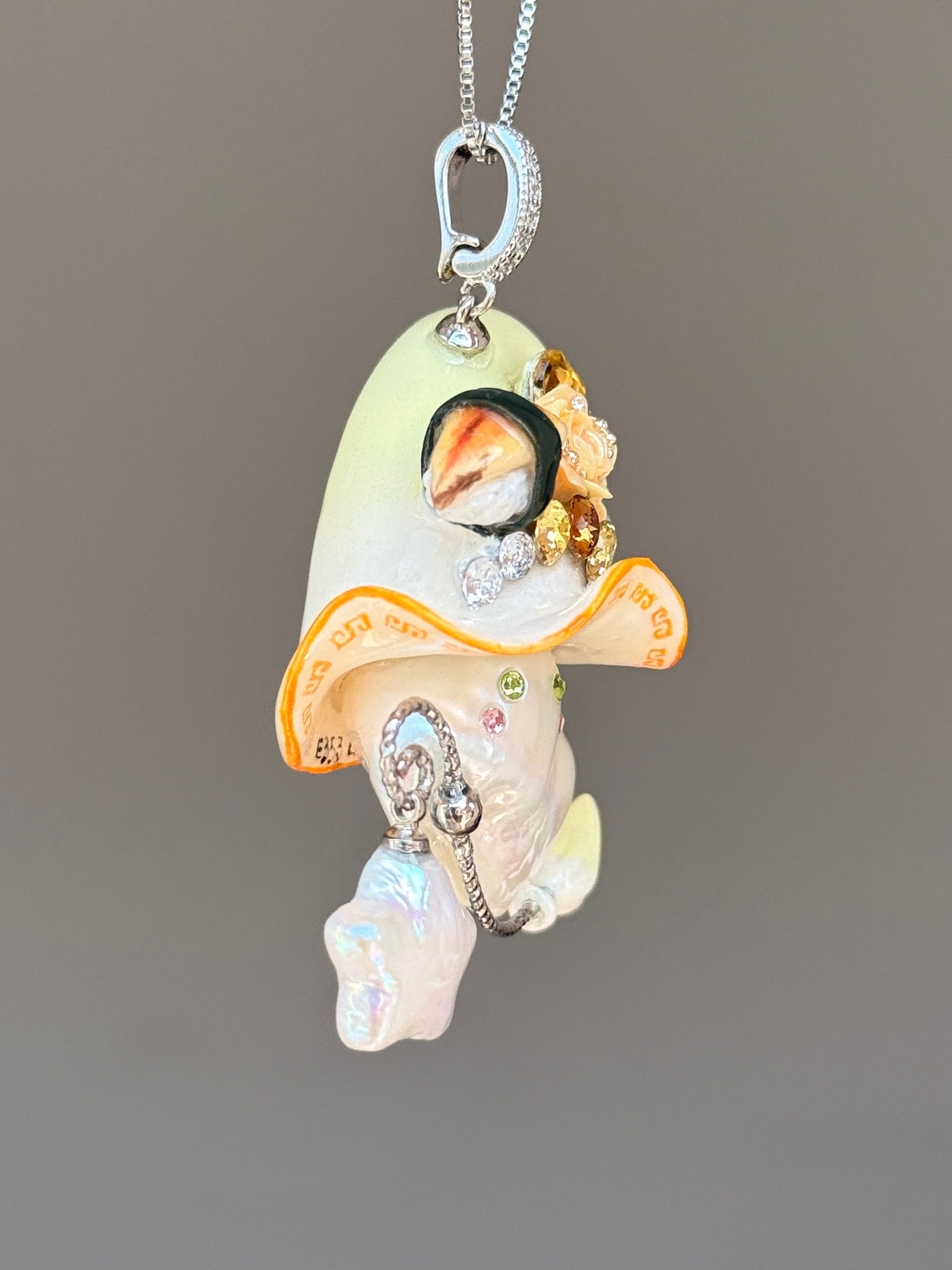 [PIECE04] Sushi Sprite baroque pearl necklace with sushi-inspired hat, sculpted sushi detail, blue floral accents, sparkling stones, dangling charm, and natural baroque pearl