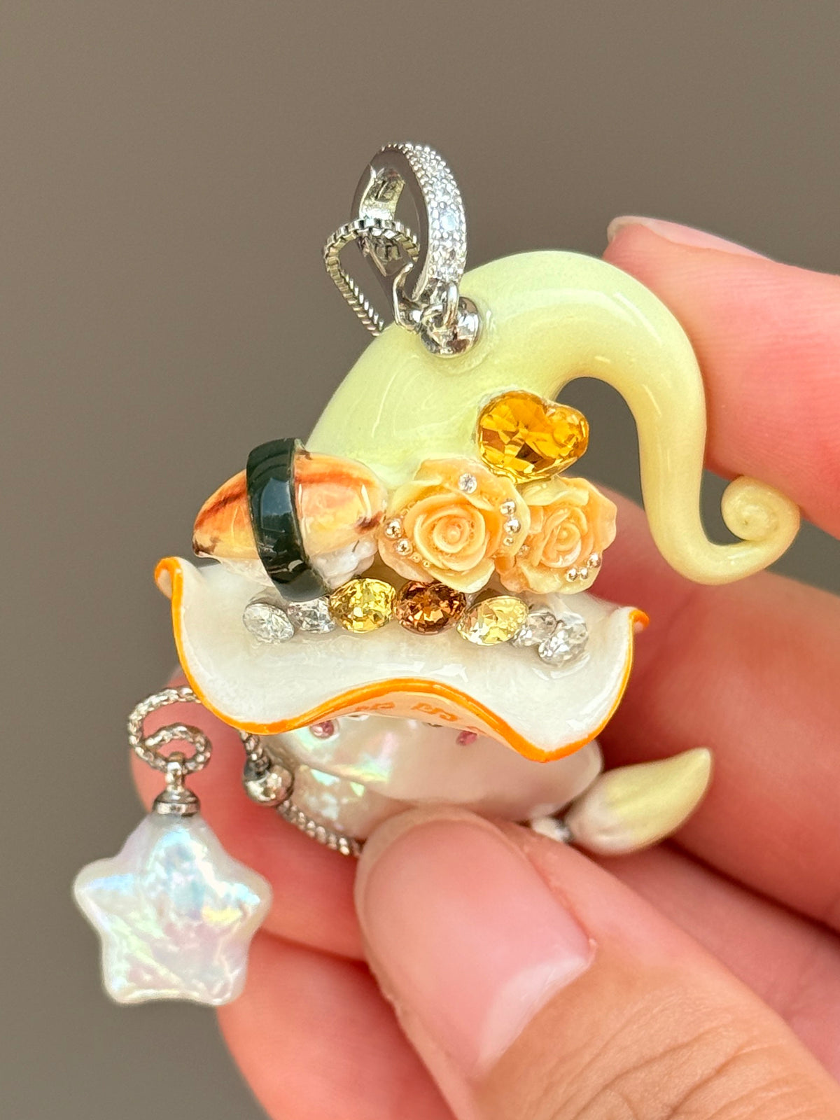 [PIECE04] Sushi Sprite baroque pearl necklace with sushi-inspired hat, sculpted sushi detail, blue floral accents, sparkling stones, dangling charm, and natural baroque pearl