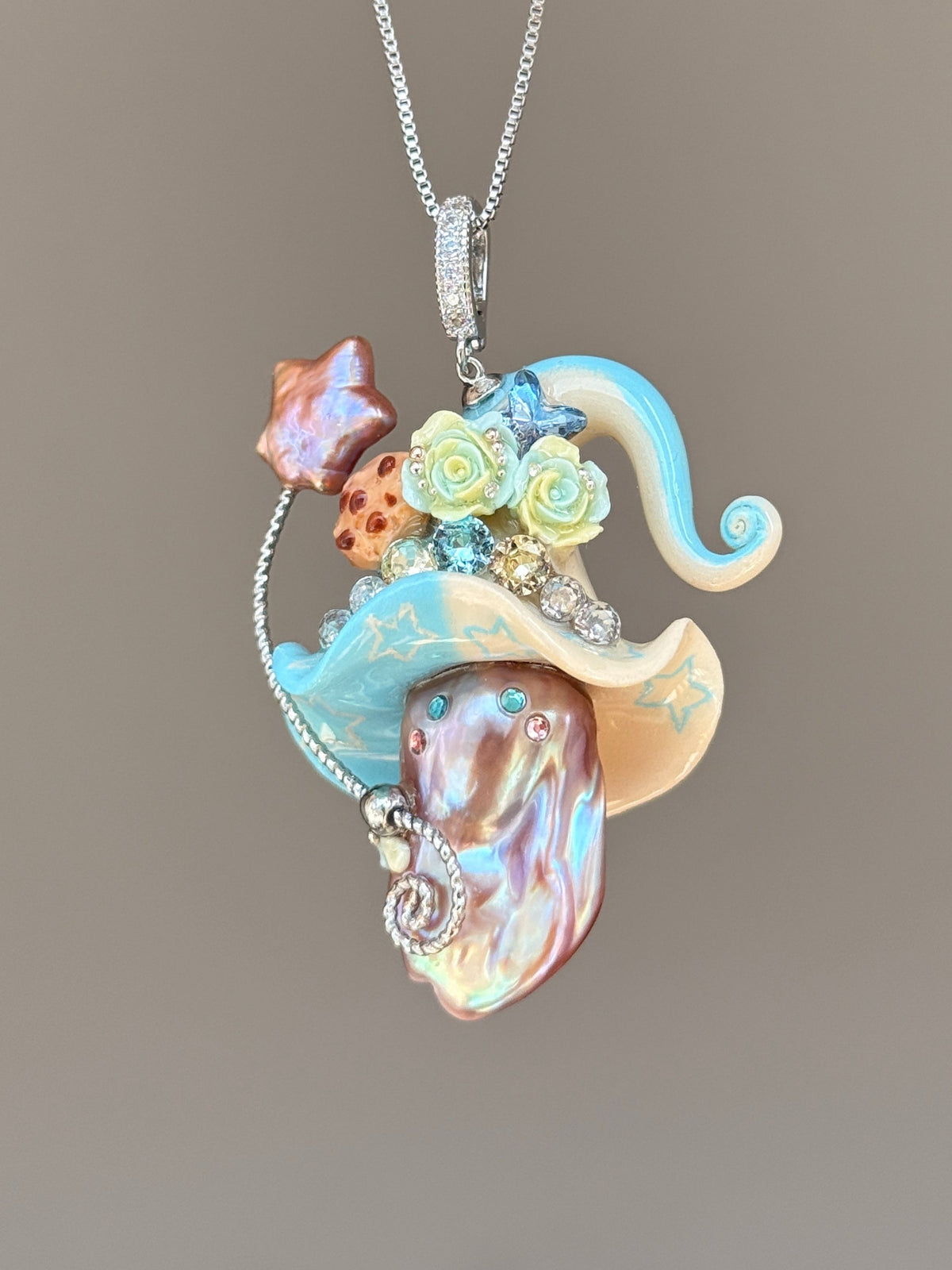 [PIECE05] Cookie Sprite baroque pearl necklace with cookie-inspired hat, sculpted cookie detail, pastel floral accents, sparkling stones, silver wand, and natural baroque pearl