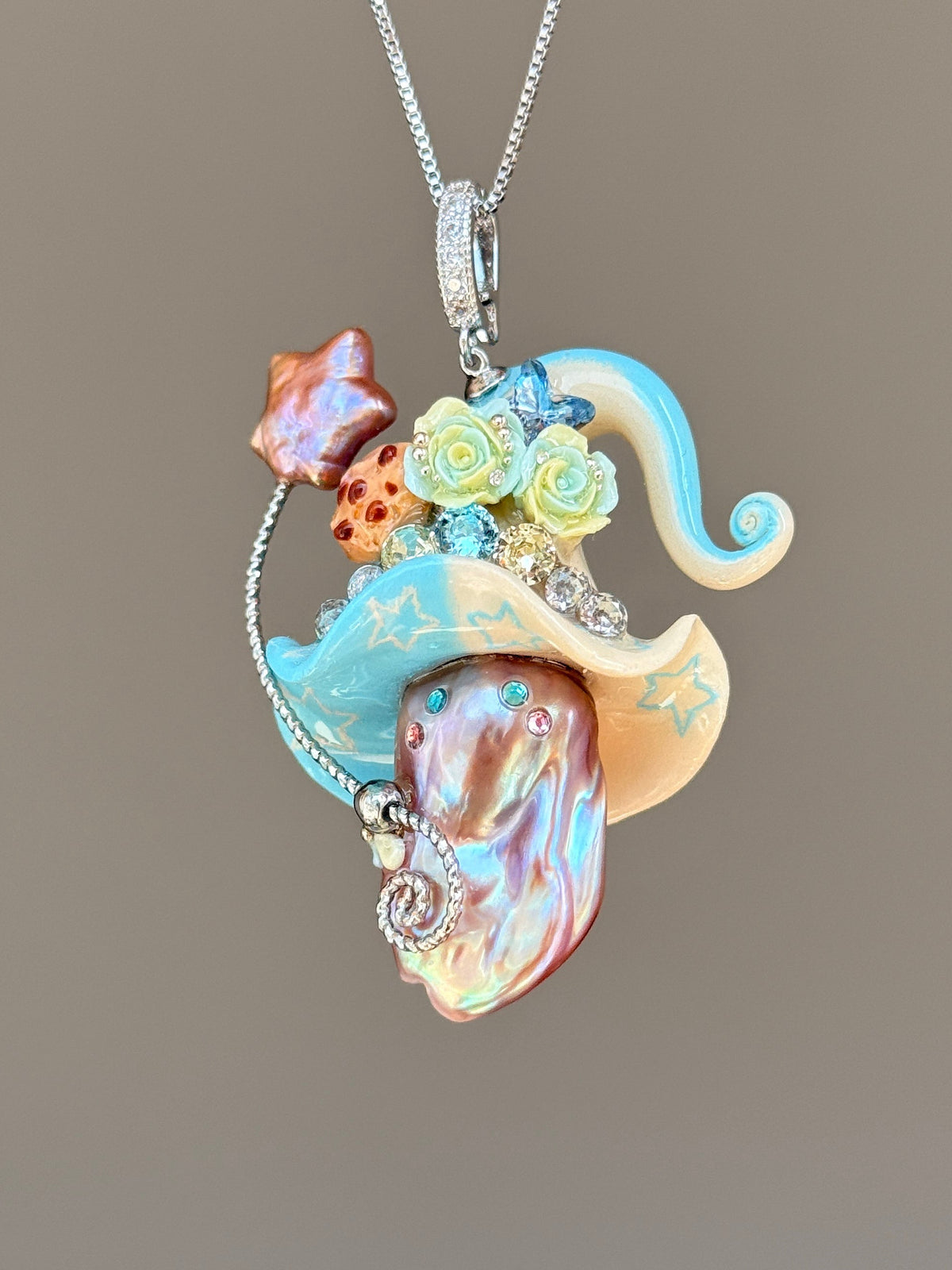 [PIECE05] Cookie Sprite baroque pearl necklace with cookie-inspired hat, sculpted cookie detail, pastel floral accents, sparkling stones, silver wand, and natural baroque pearl