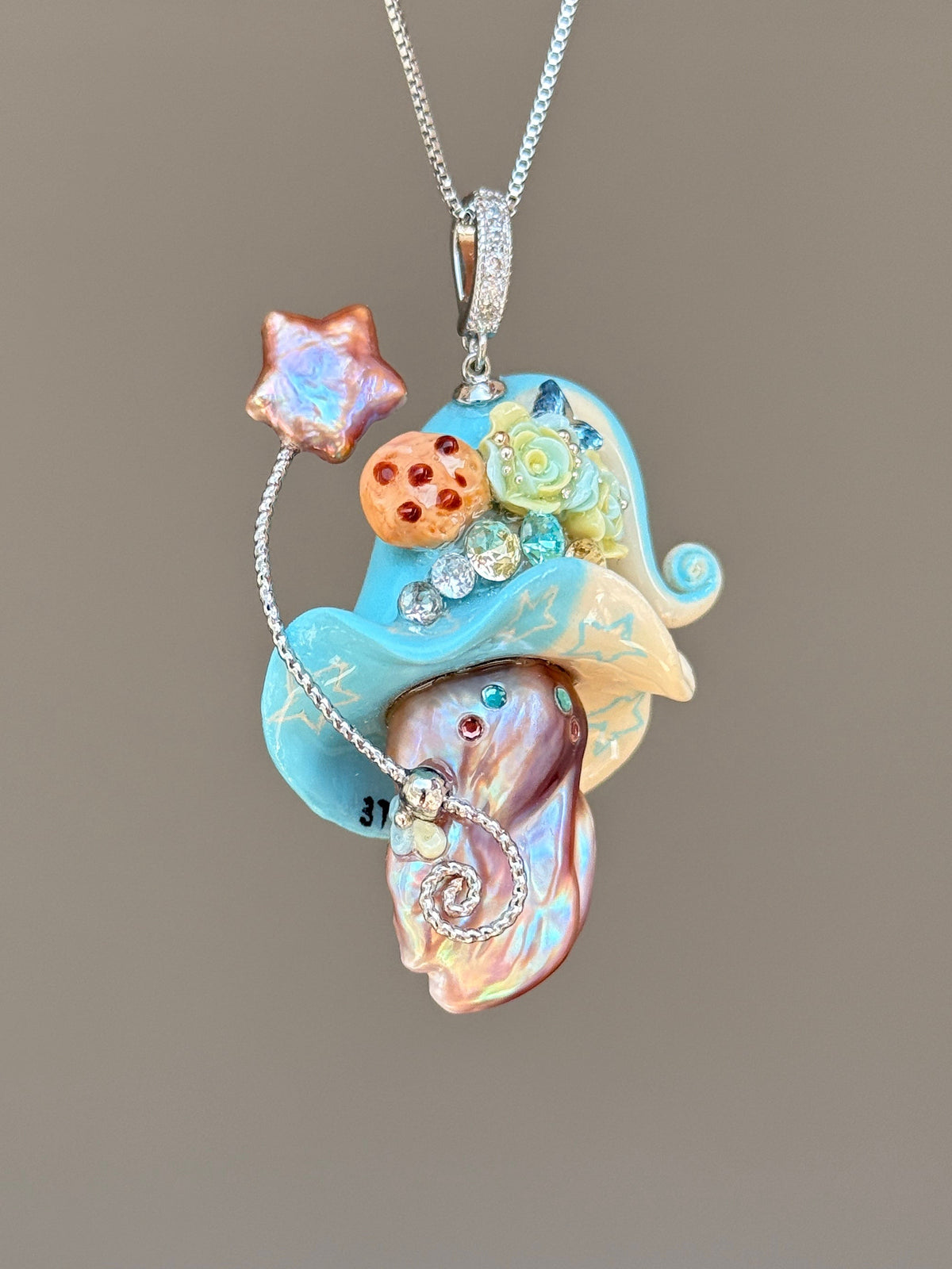 [PIECE05] Cookie Sprite baroque pearl necklace with cookie-inspired hat, sculpted cookie detail, pastel floral accents, sparkling stones, silver wand, and natural baroque pearl