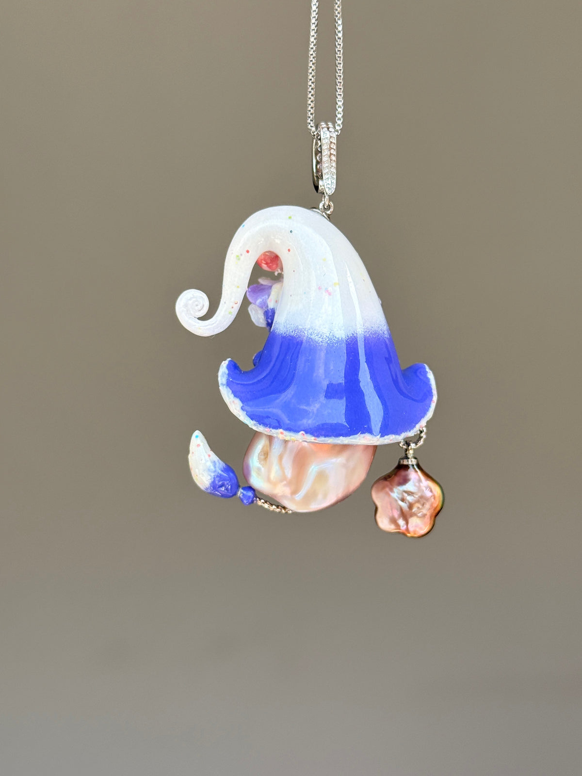 [PIECE01] Lollipop Sprite baroque pearl necklace with a curled mini hat, sculpted candy details, floral accents, sparkling crystals, a dangling charm, and natural baroque pearl