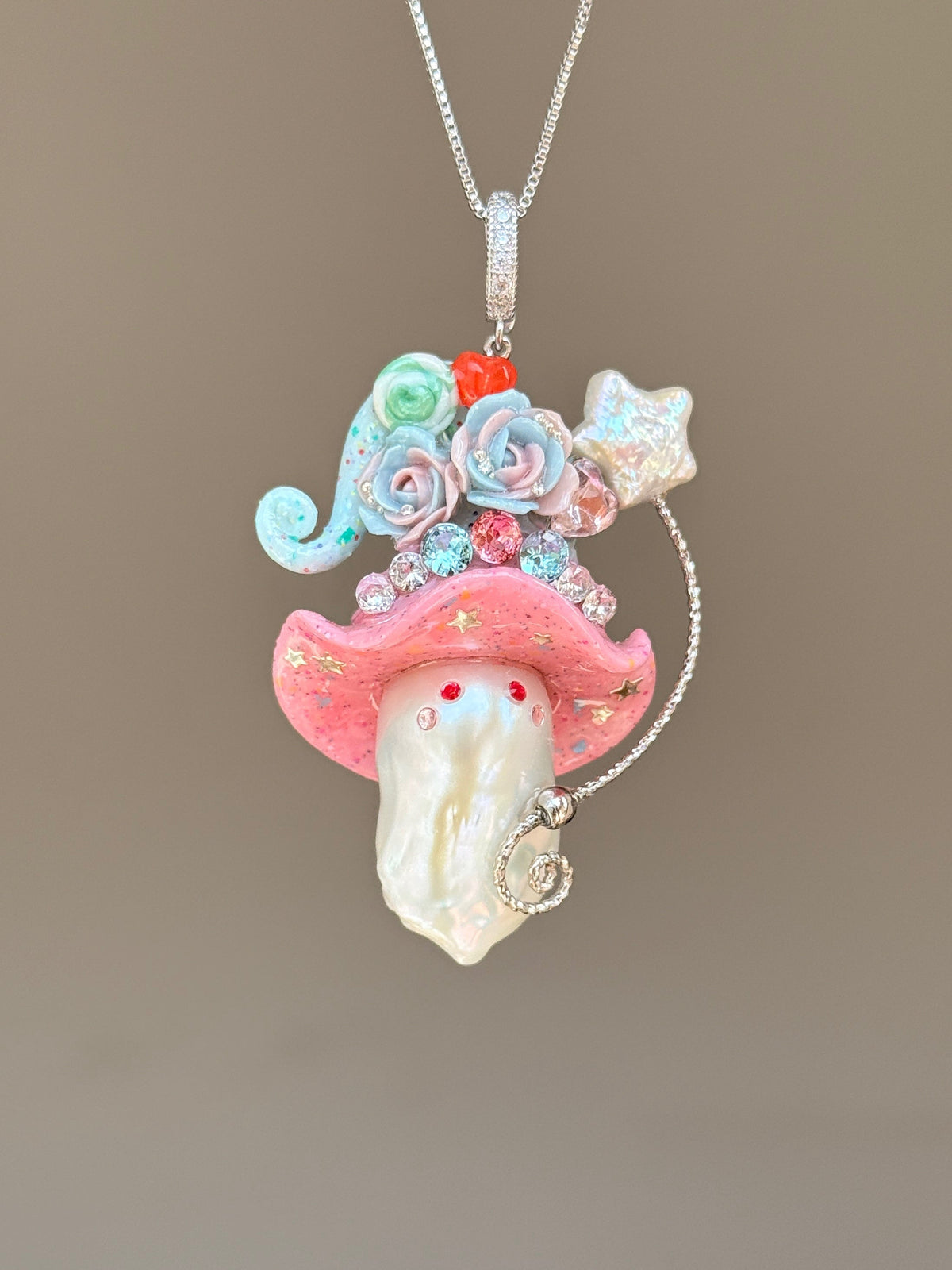[PIECE04] Lollipop Sprite baroque pearl necklace with a curled mini hat, sculpted candy details, floral accents, sparkling crystals, a dangling charm, and natural baroque pearl