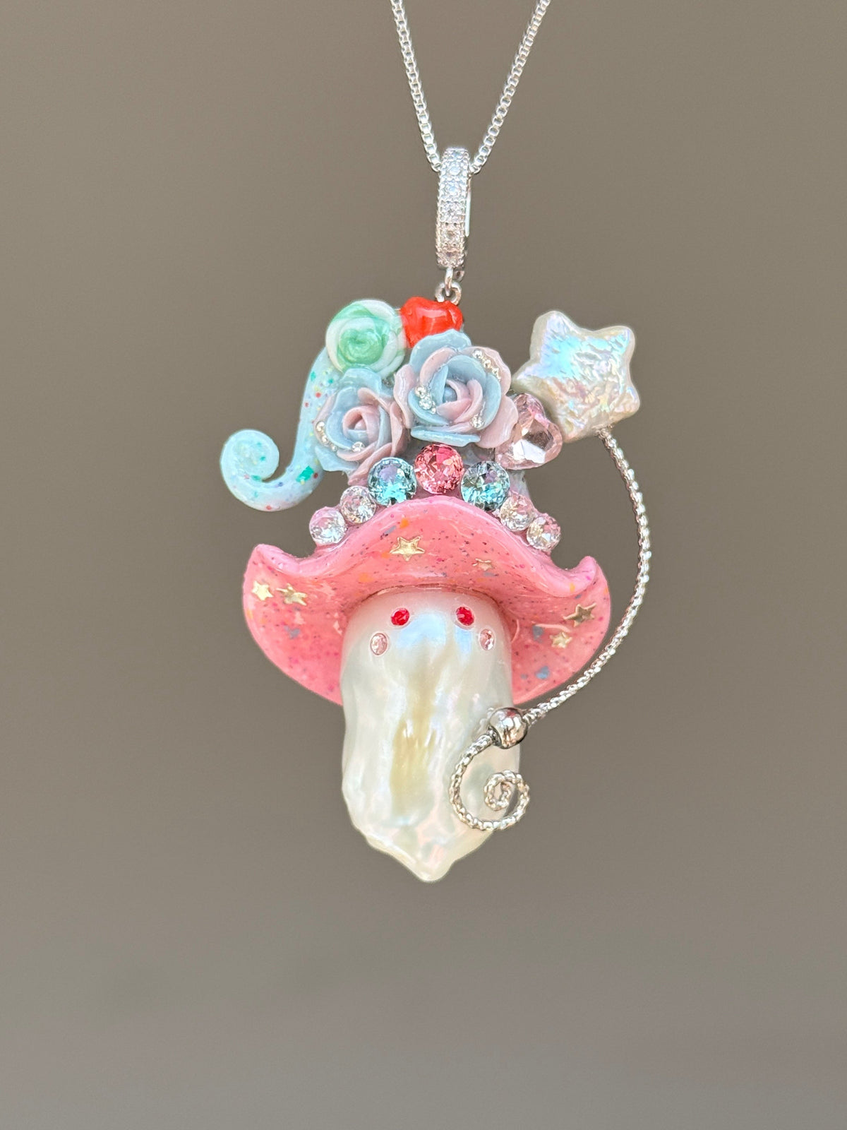 [PIECE04] Lollipop Sprite baroque pearl necklace with a curled mini hat, sculpted candy details, floral accents, sparkling crystals, a dangling charm, and natural baroque pearl