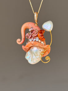 [PIECE05] Bakery Sprite baroque pearl necklace with coral croissant-inspired hat, sculpted pastry detail, rose accents, gold wand, and natural baroque pearl