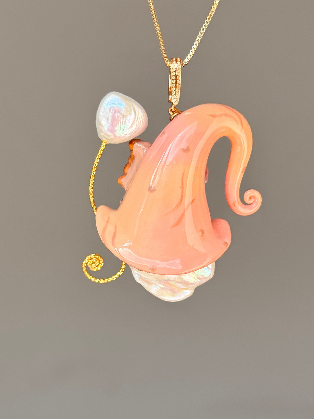 [PIECE05] Bakery Sprite baroque pearl necklace with coral croissant-inspired hat, sculpted pastry detail, rose accents, gold wand, and natural baroque pearl